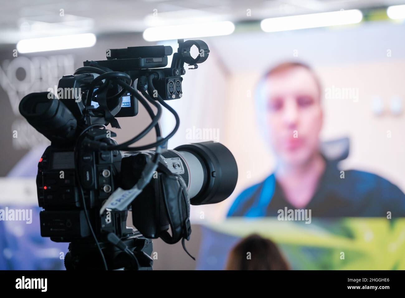 Professional camera shooting video of online conference Stock Photo Alamy