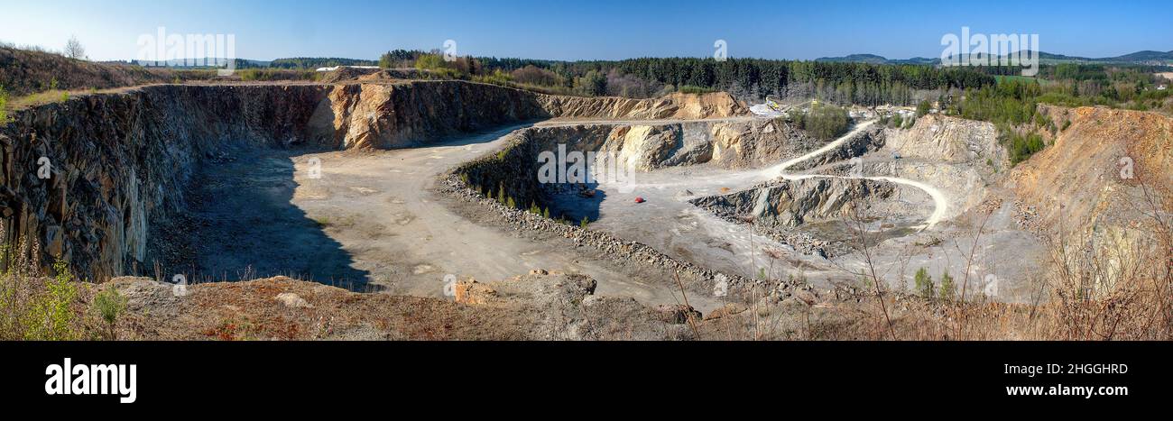 Stone quarry - panorama landscape with open-pit mine Stock Photo