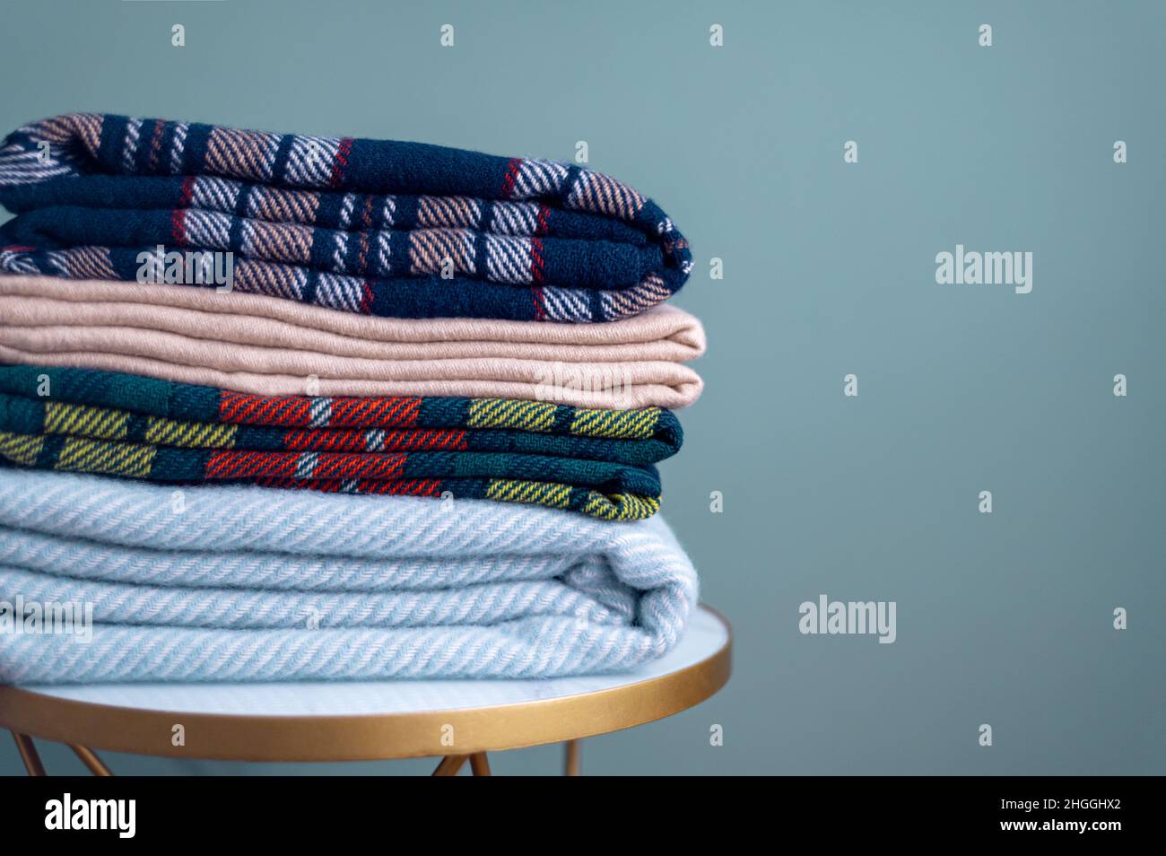 Stack of woolen checked blankets Stock Photo