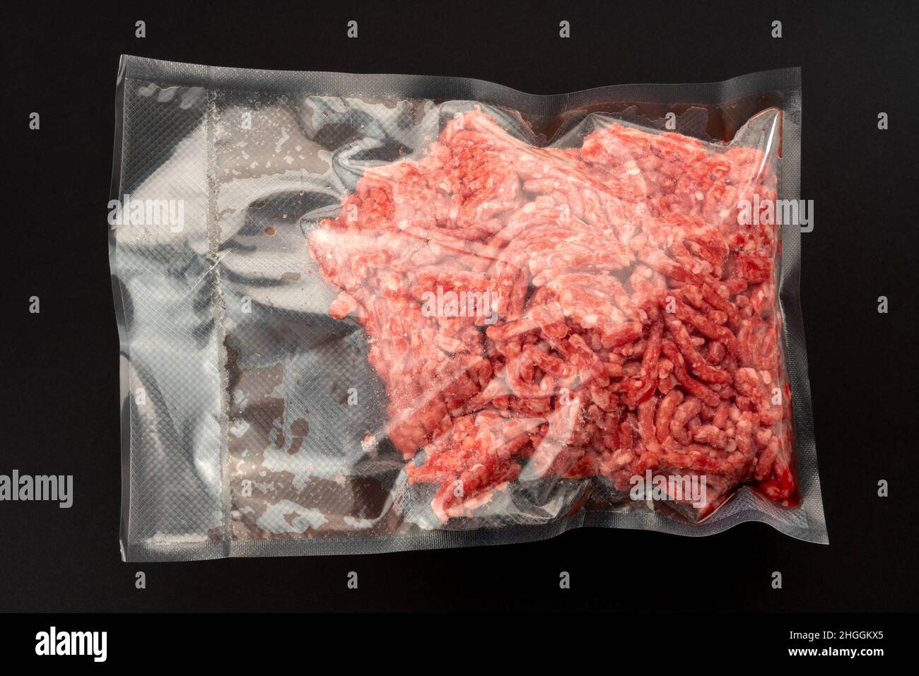 Minced beef in vacuum packed sealed for sous vide cooking on nero background Stock - Alamy