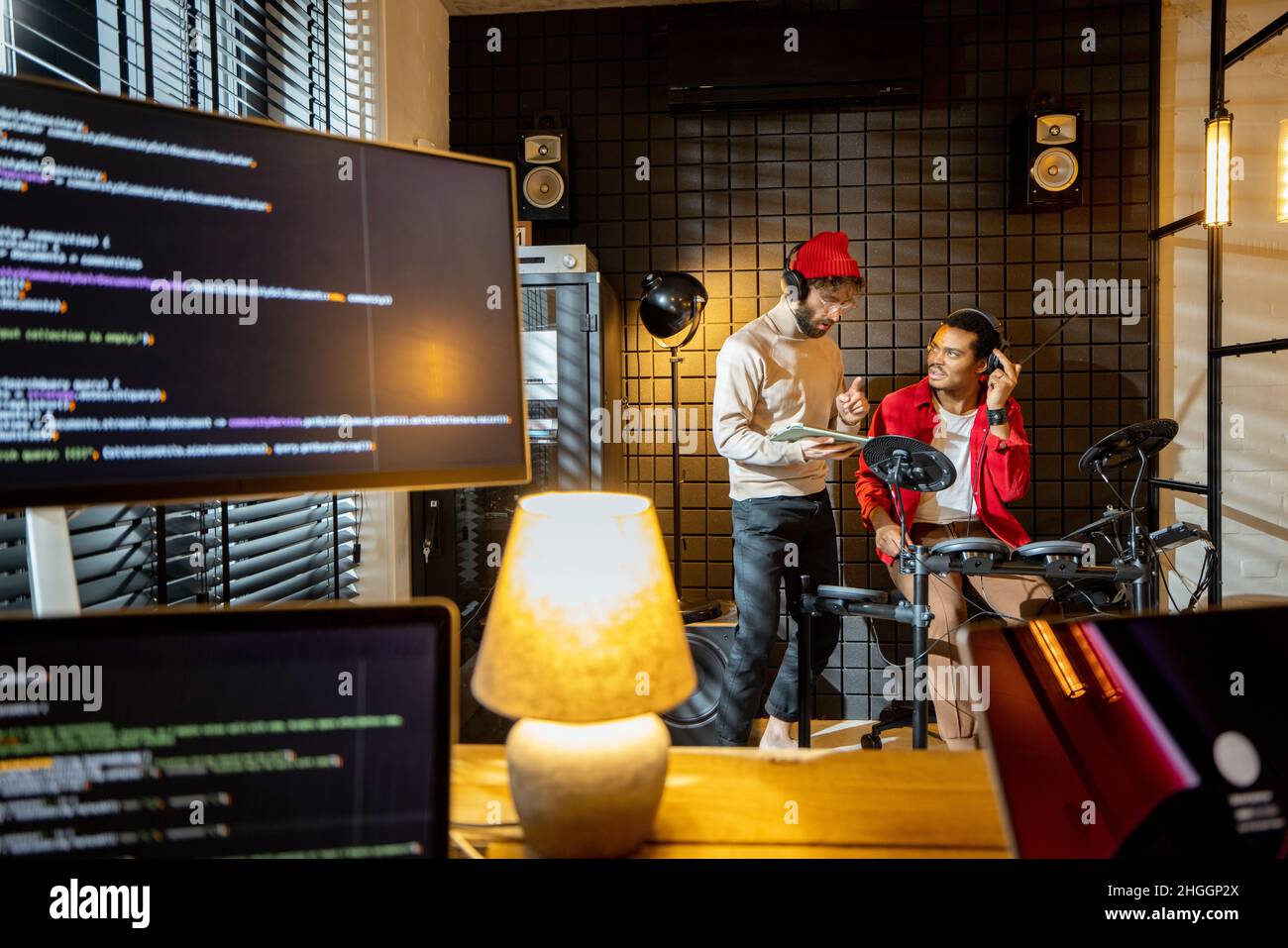 Men playing electric drums at home sstudio Stock Photo
