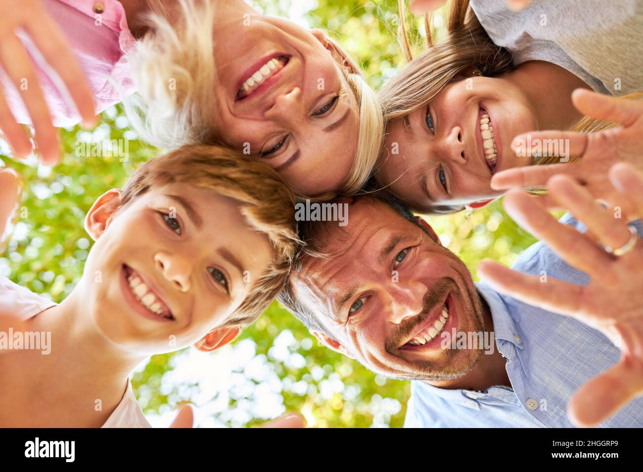 Cheerful family two children hi-res stock photography and images - Alamy