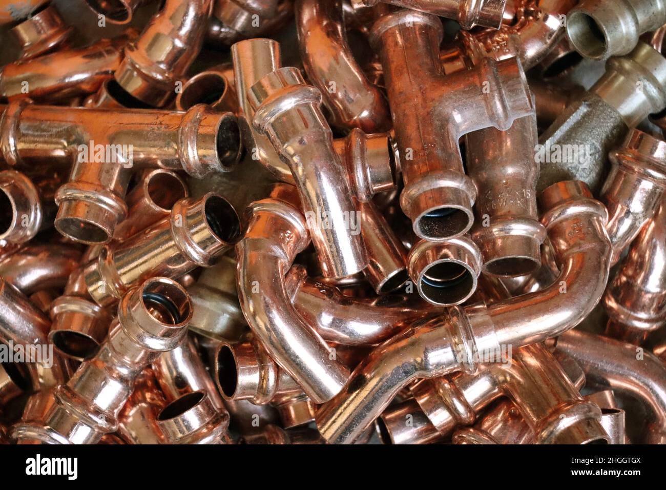 copper heating pipes various small parts Stock Photo Alamy