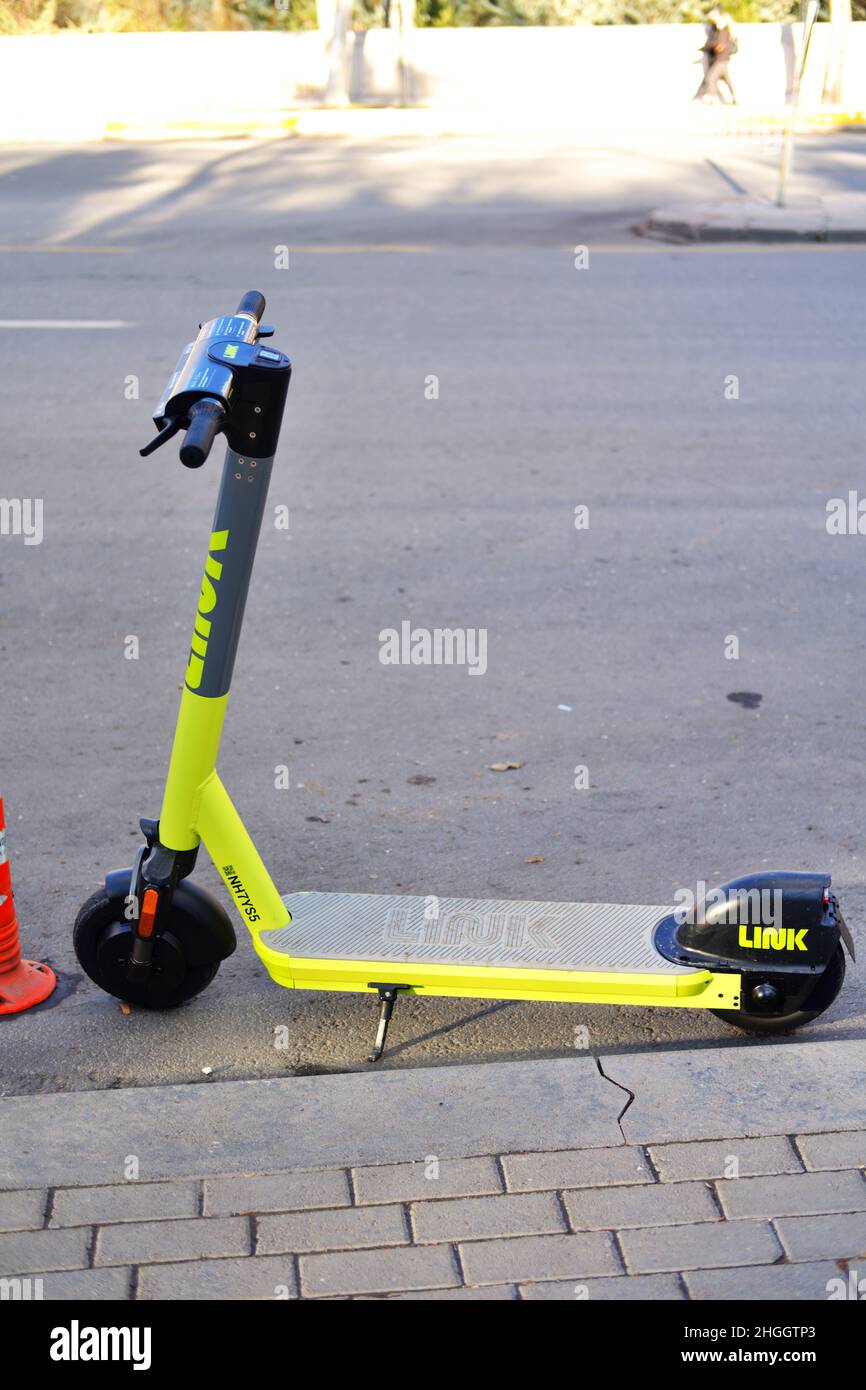 Parked rental scooter standing roadside in Ankara /Turkey Stock Photo