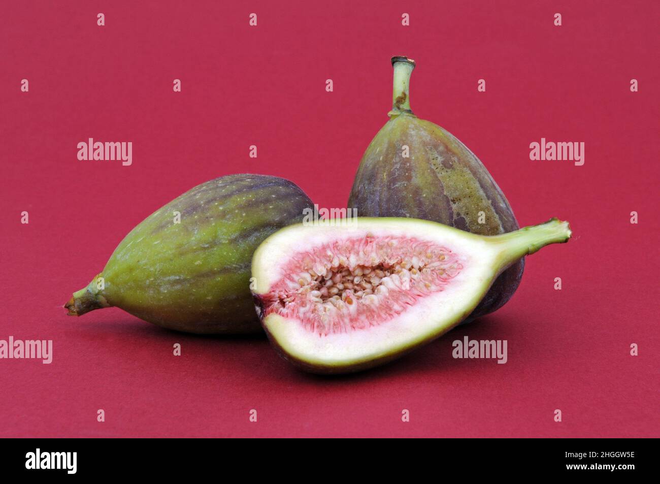 Edible fig, Common fig, Figtree (Ficus carica), Two whole figs and one