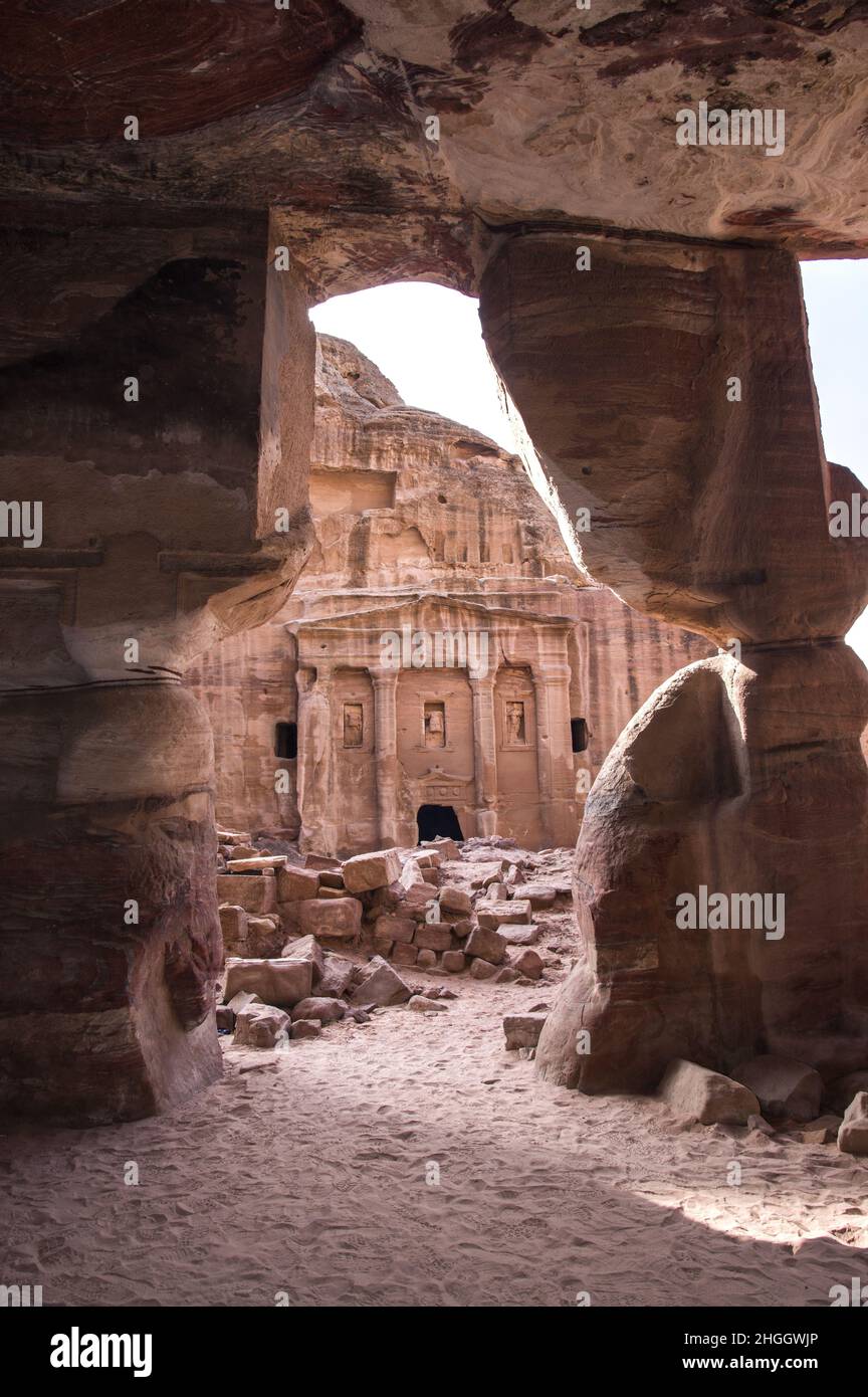 Petra Jordan, with canyons, caves, desert landscape and buildings, tombs and other structures carved by the Nabateans centuries ago into the pink rock Stock Photo