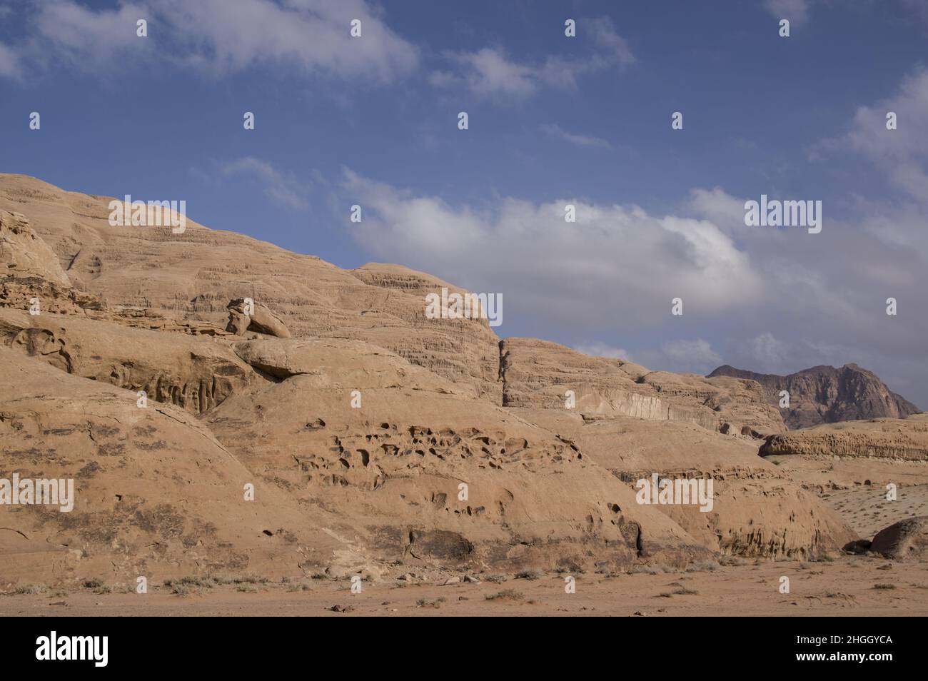 Desert landscape of Wadi Rum, a canyon in Jordan with red sands and cliff walls. Stock Photo