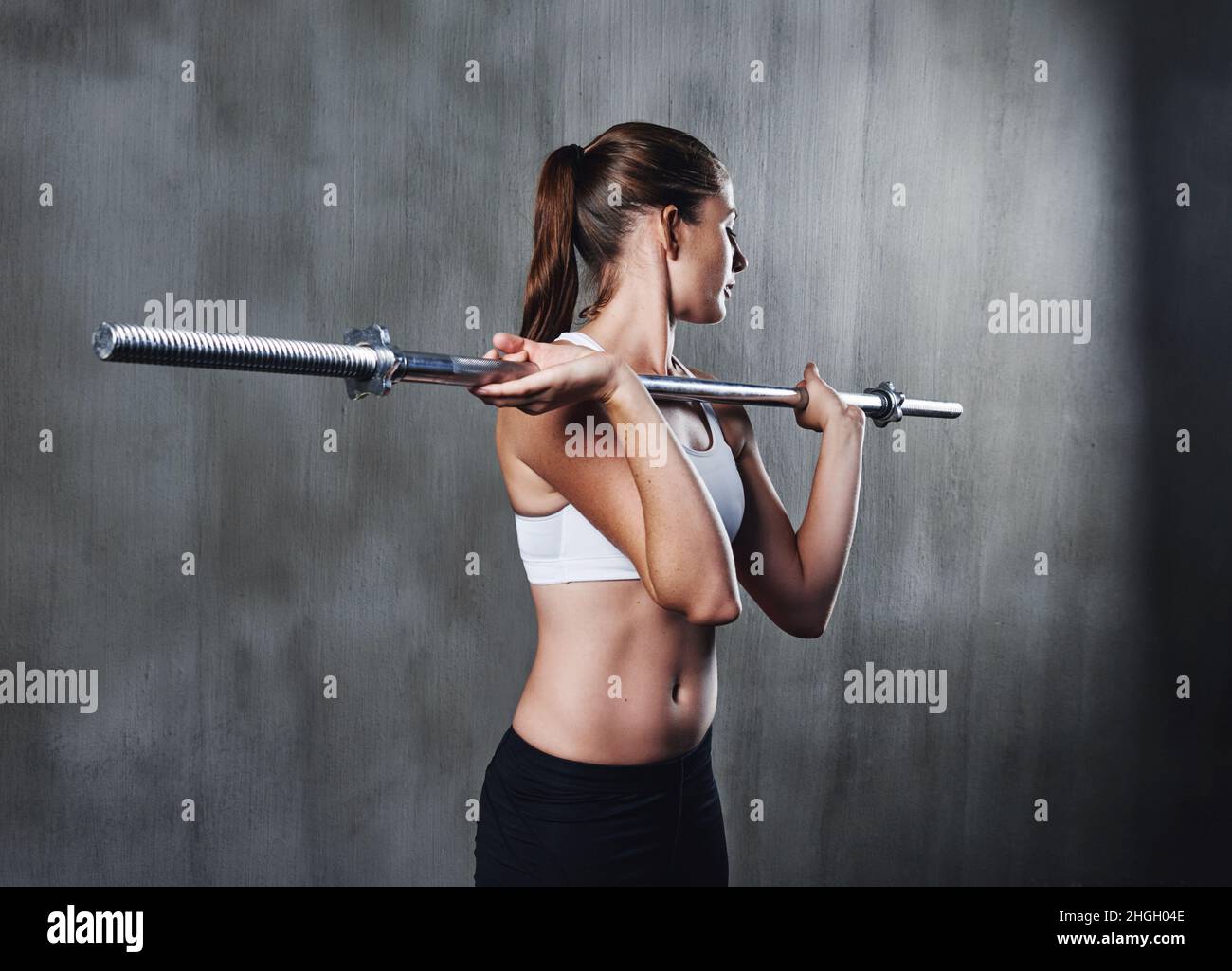 Strong Girl Activewear Pointing Her Muscular Stock Photo 720919297