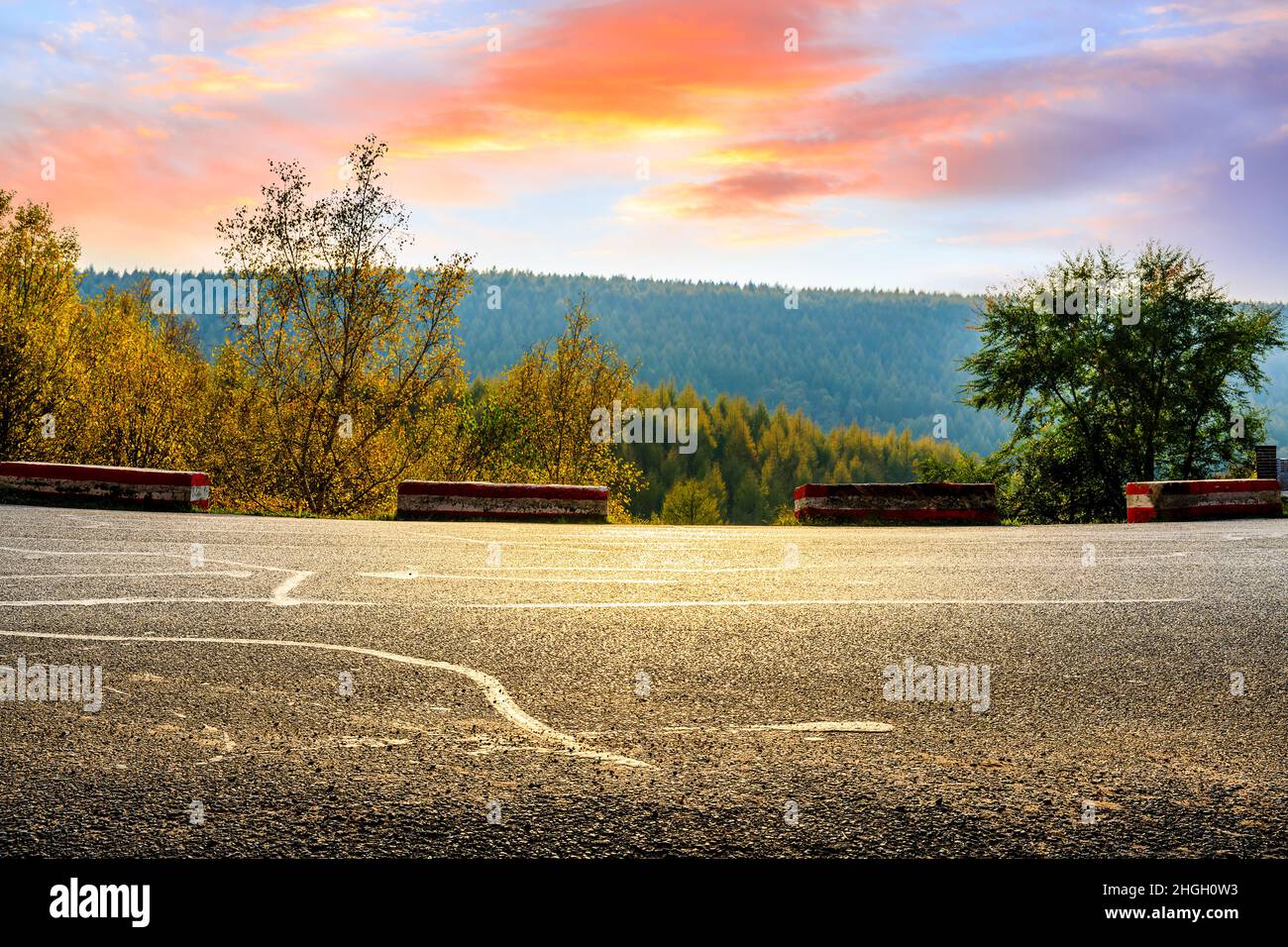 Empty asphalt road and autumn trees landscape at sunrise.Road and ...
