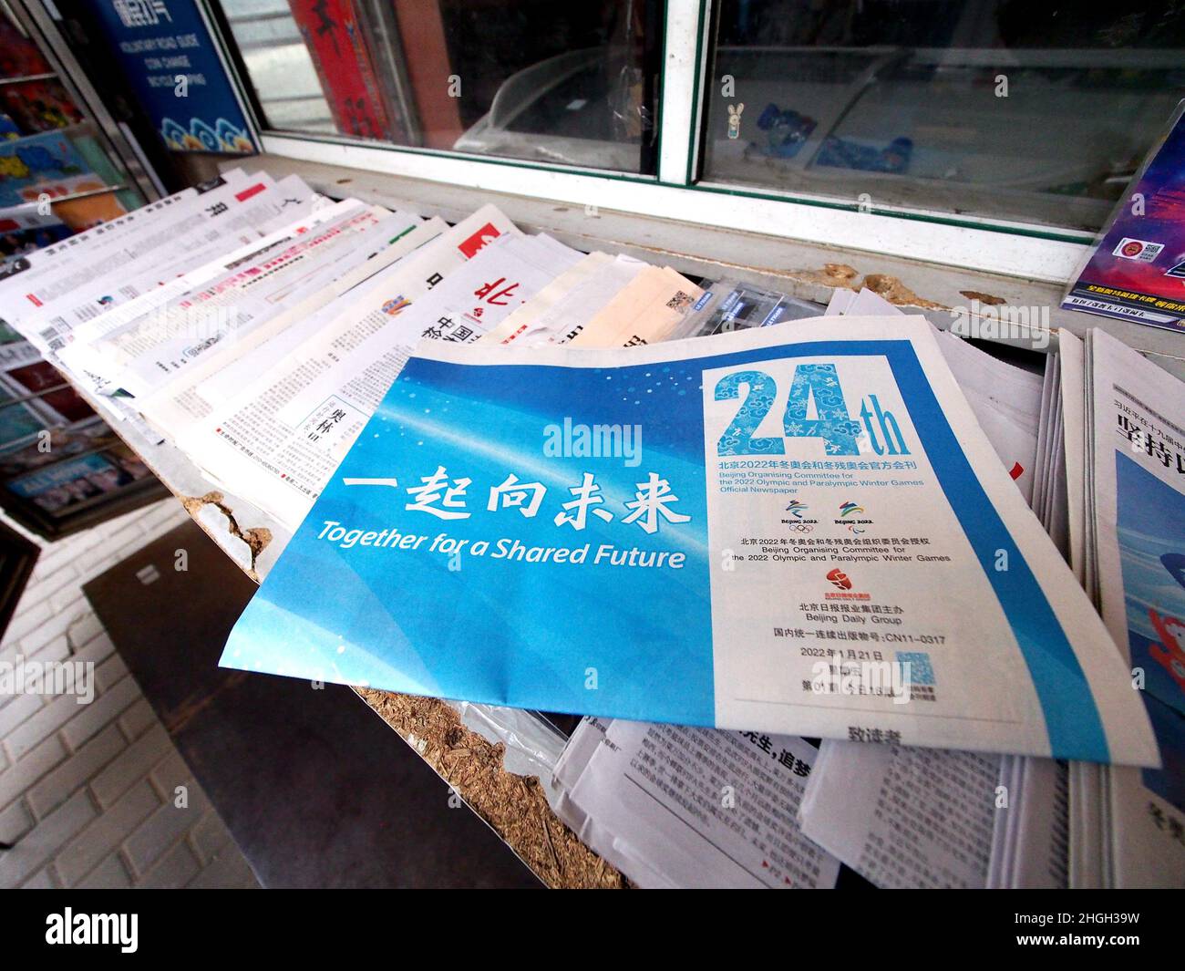 BEIJING, CHINA - JANUARY 212, 2022 - People buy winter Olympics periodicals at a post kiosk in Beijing, Capital of China, Jan. 21, 2022. The official Stock Photo