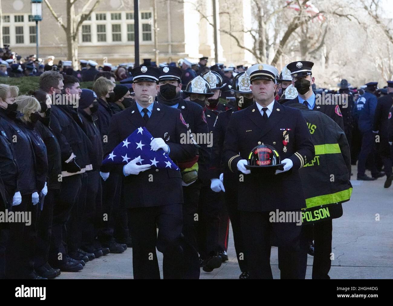 St. Louis, United States. 21st Jan, 2022. St. Louis firefighters carry the turnout gear of the late fellow St. Louis firefighter Ben Polson as they leave services from the Cathedral Basilica of Saint Louis, in St. Louis on Thursday, January 20, 2022. Polson, the first St. Louis firefighter to die in a fire in twenty years, died while battling a vacant house fire on January 13, 2022. Photo by Bill Greenblatt/UPI Credit: UPI/Alamy Live News Stock Photo