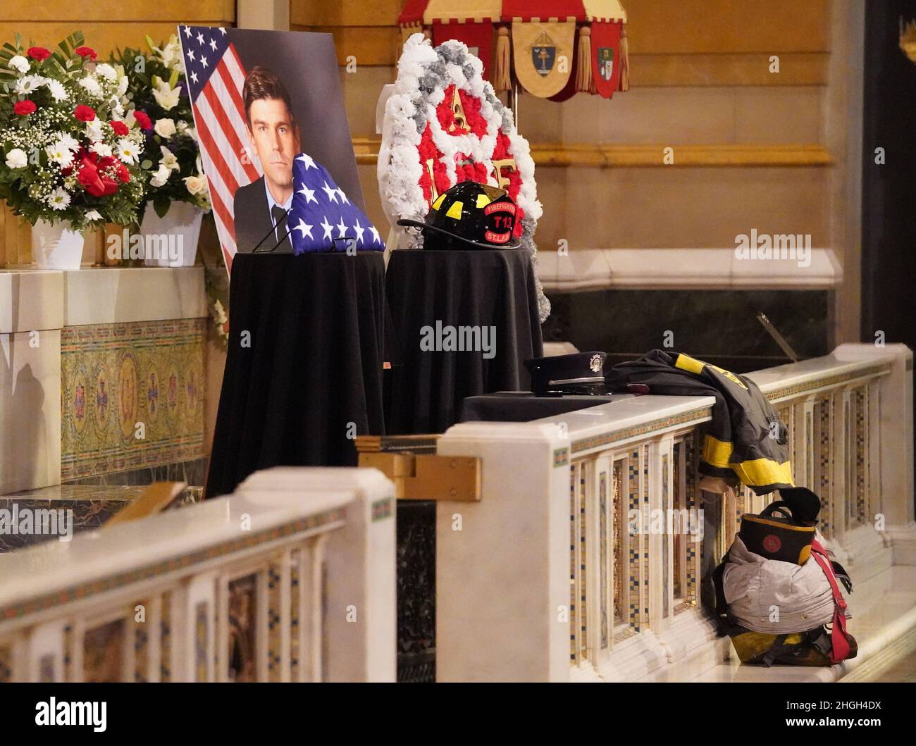 St. Louis, United States. 21st Jan, 2022. The turnout gear for St. Louis firefighter Ben Polson are displayed at the Cathedral Basilica of Saint Louis, in St. Louis on Thursday, January 20, 2022. Polson, the first St. Louis firefighter to die in a fire in twenty years, died while battling a vacant house fire on January 13, 2022. Photo by Bill Greenblatt/UPI Credit: UPI/Alamy Live News Stock Photo