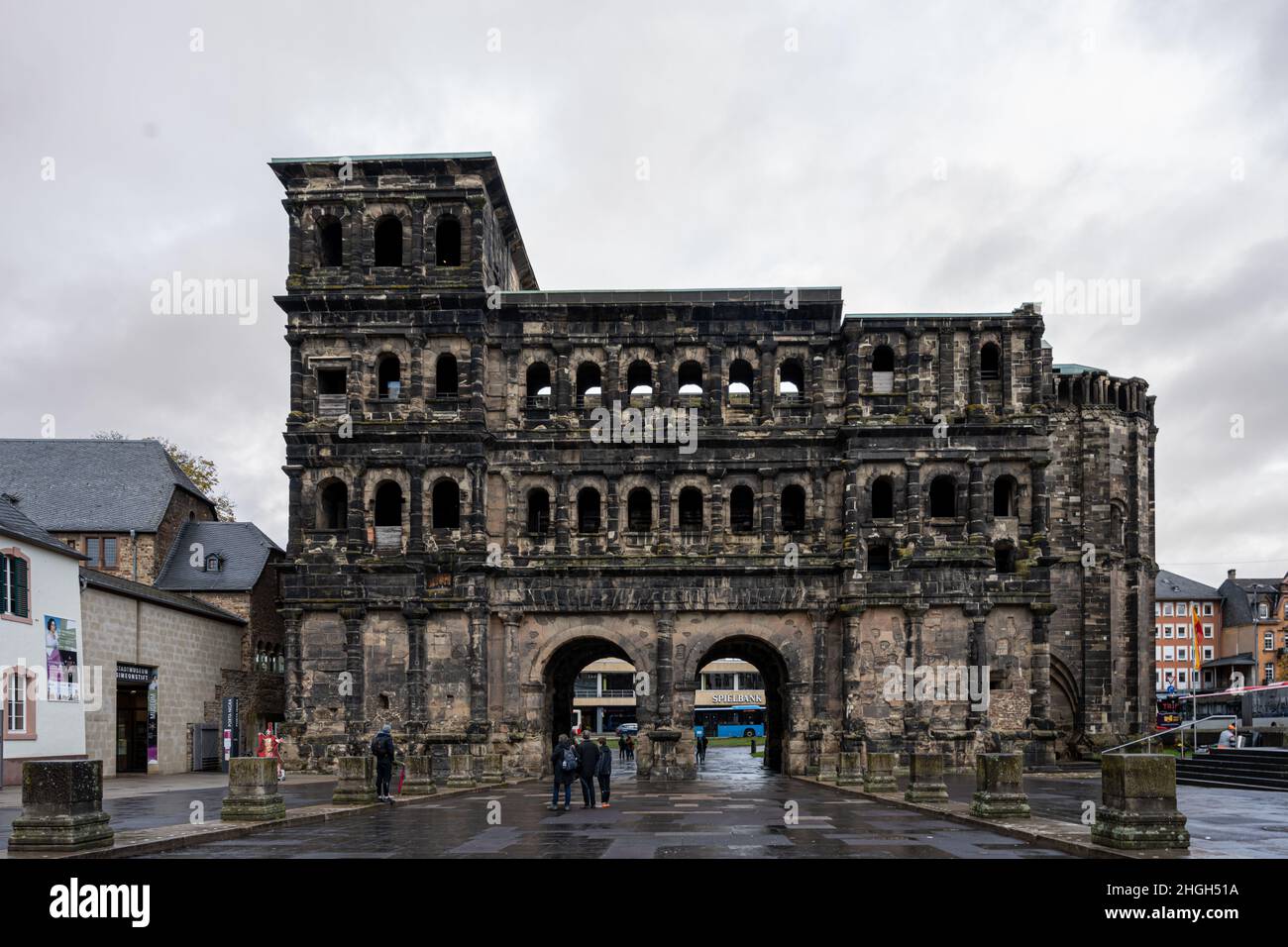 Trier, Germany - November 2, 2021: Porta Nigra, or The Black Gate is a large Roman city gate. It is designated as part of the Roman Monuments in Trier UNESCO World Heritage Site Stock Photo