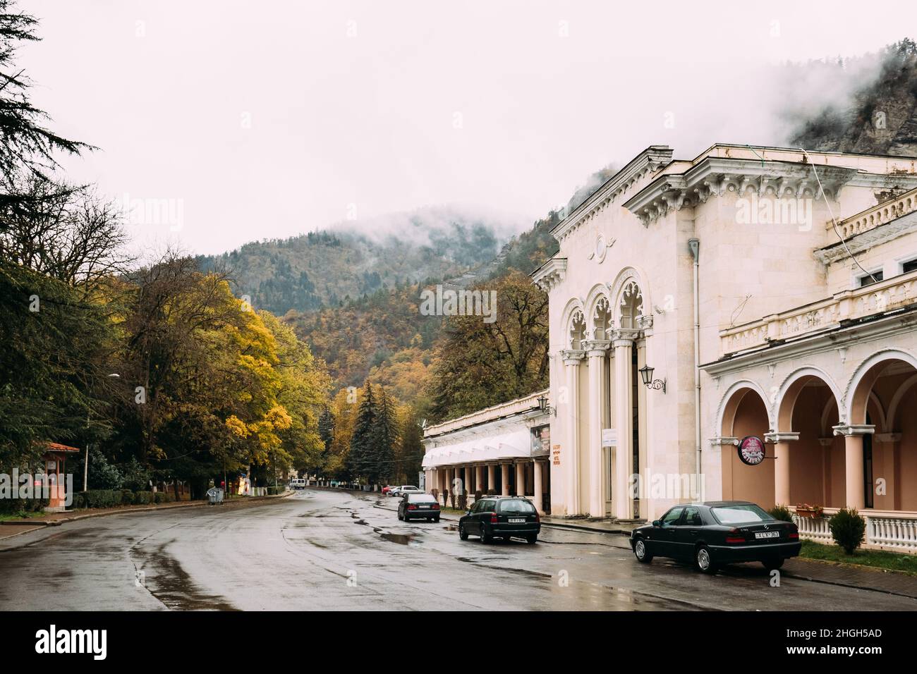 Borjomi, Samtskhe-Javakheti, Georgia. Cars Parked Near Borjomi Parki Railway Station Building In Autumn Day Stock Photo