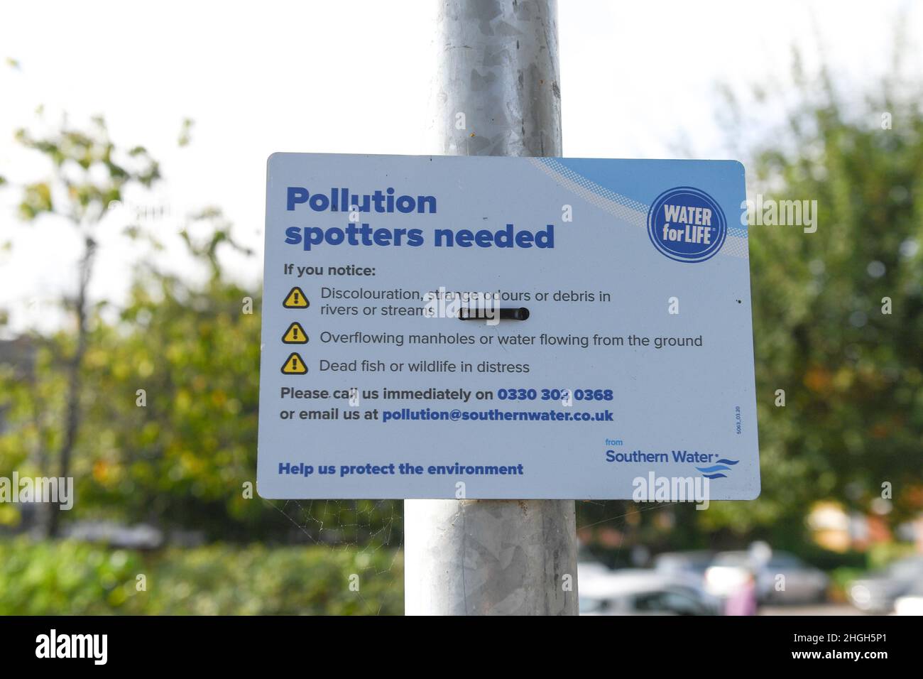 Southern water initiative sign asking for public pollution spotters in the market town of Romsey hampshire England. Stock Photo