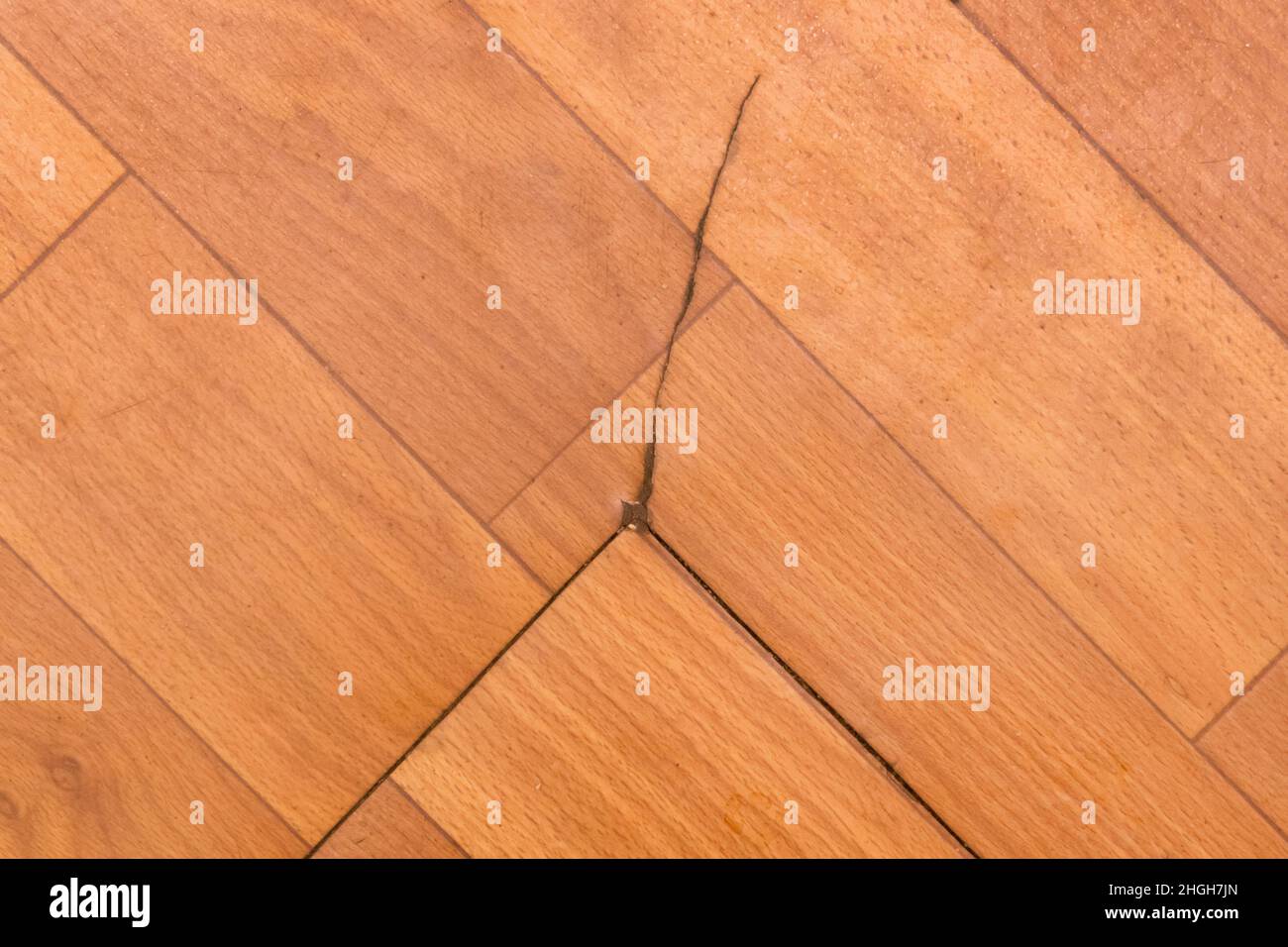 Broken torn linoleum old rubber polymer PVC floor damage material