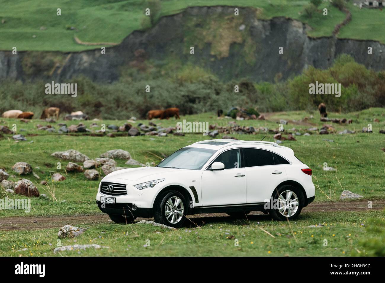 White Infiniti FX30d turbo diesel SUV Car On Off Road In Spring ...