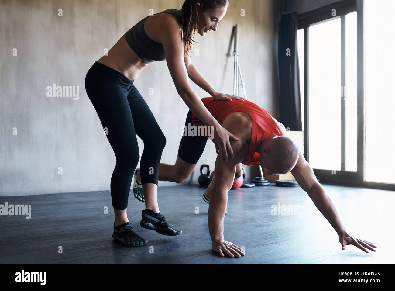 Training to fighting fit. A workout session in a gym Stock Photo