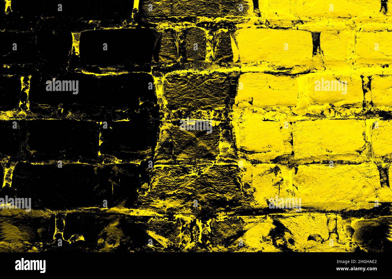 Yellow painted dark brick wall surface with grunge texture for background Stock Photo