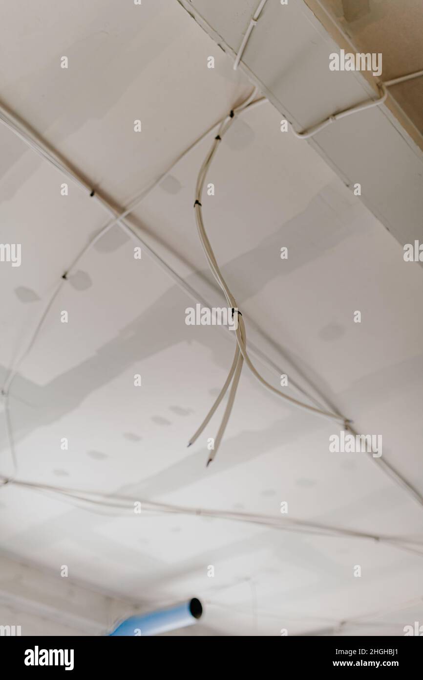 Electric Wires network Mounted on Ceiling Stock Photo - Alamy