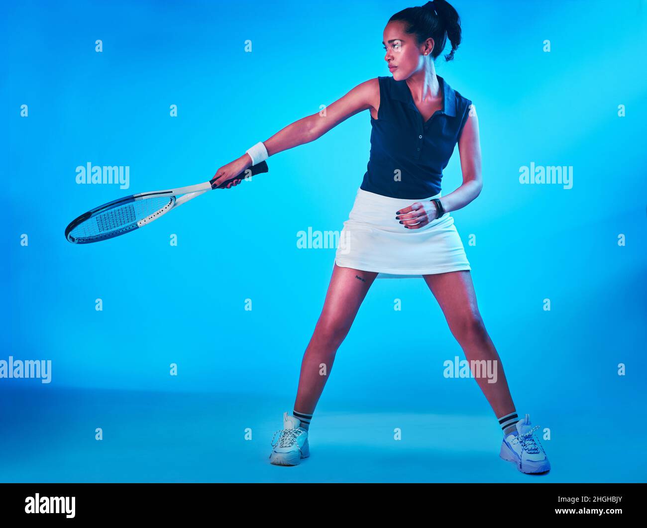 Premium Photo  Ive mastered my technique. shot of a female tennis player  posing with a racket.