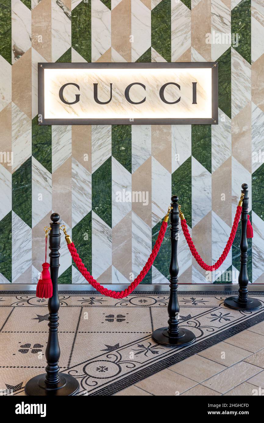 Granite mosaic patterns at entrance to Gucci Boutique at the Shops of Waterside - upscale shopping mall, Naples, Florida, USA Stock Photo