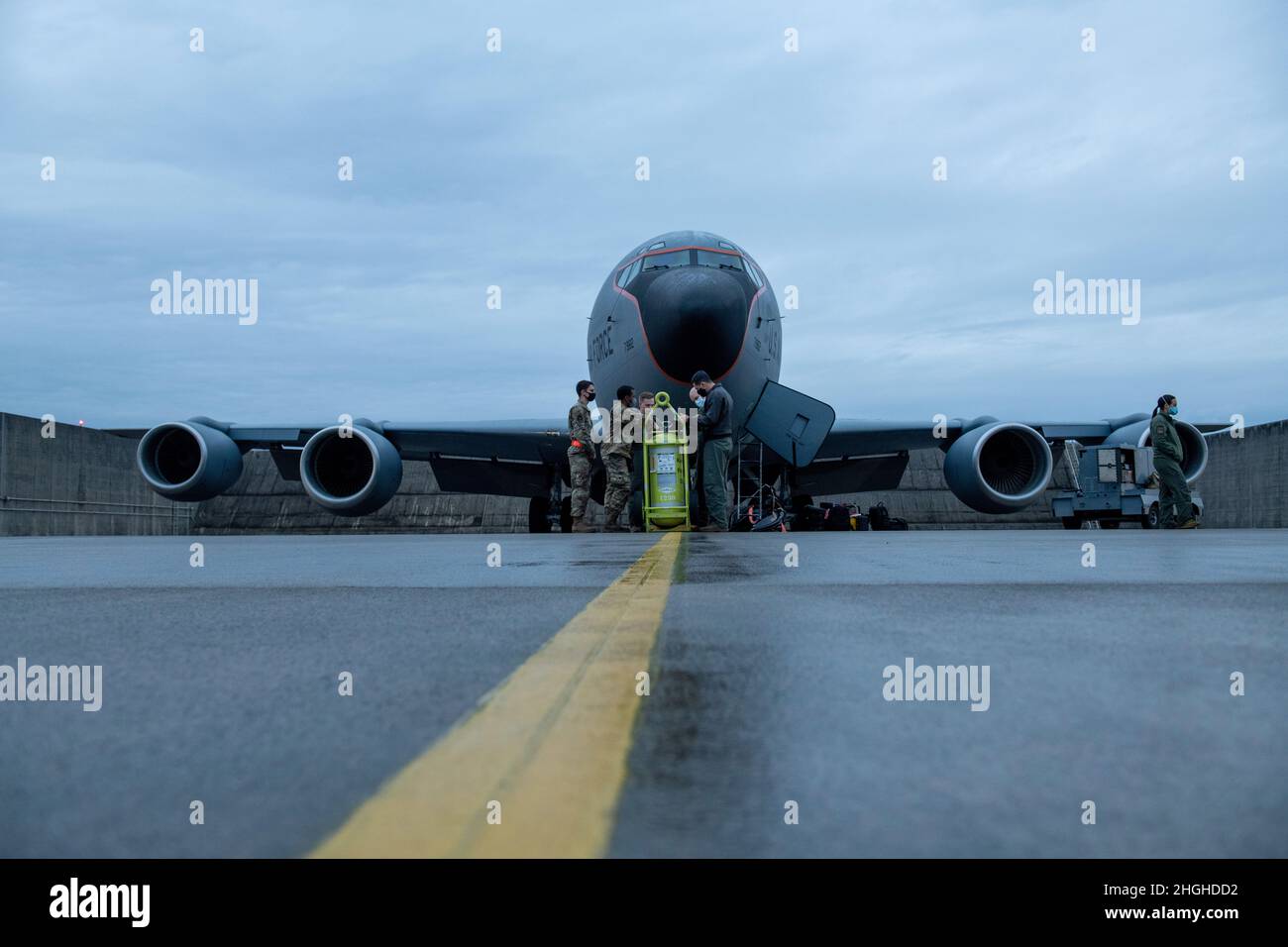 U.S. Air Force Airmen conduct a preflight brief before takeoff in