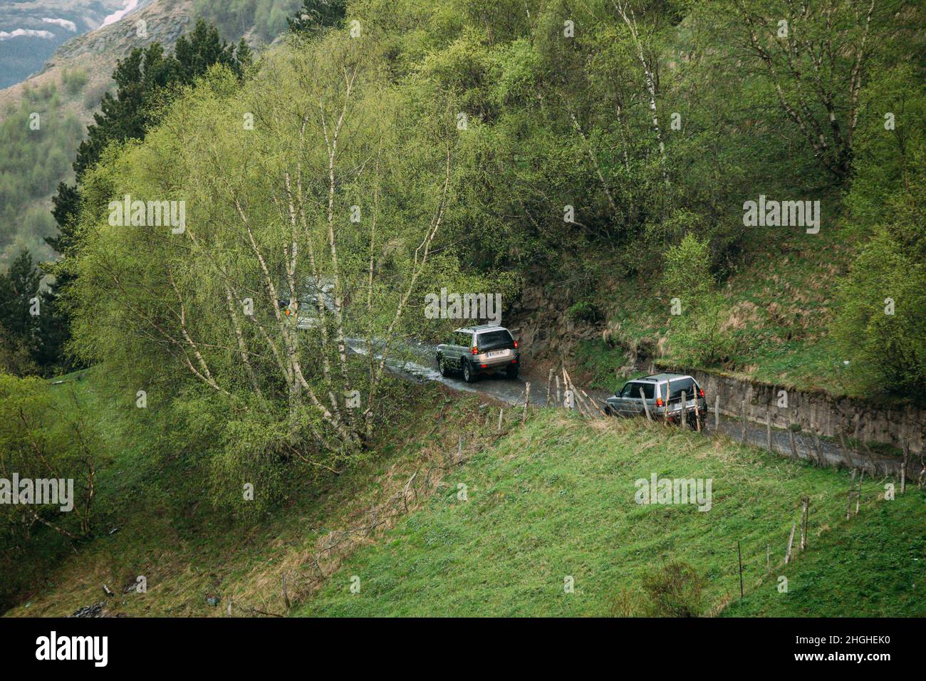 Mitsubishi Montero Sport SUV car driving on off road in summer mountain. Mitsubishi Pajero Sport is a mid-size SUV produced by the Japanese Stock Photo