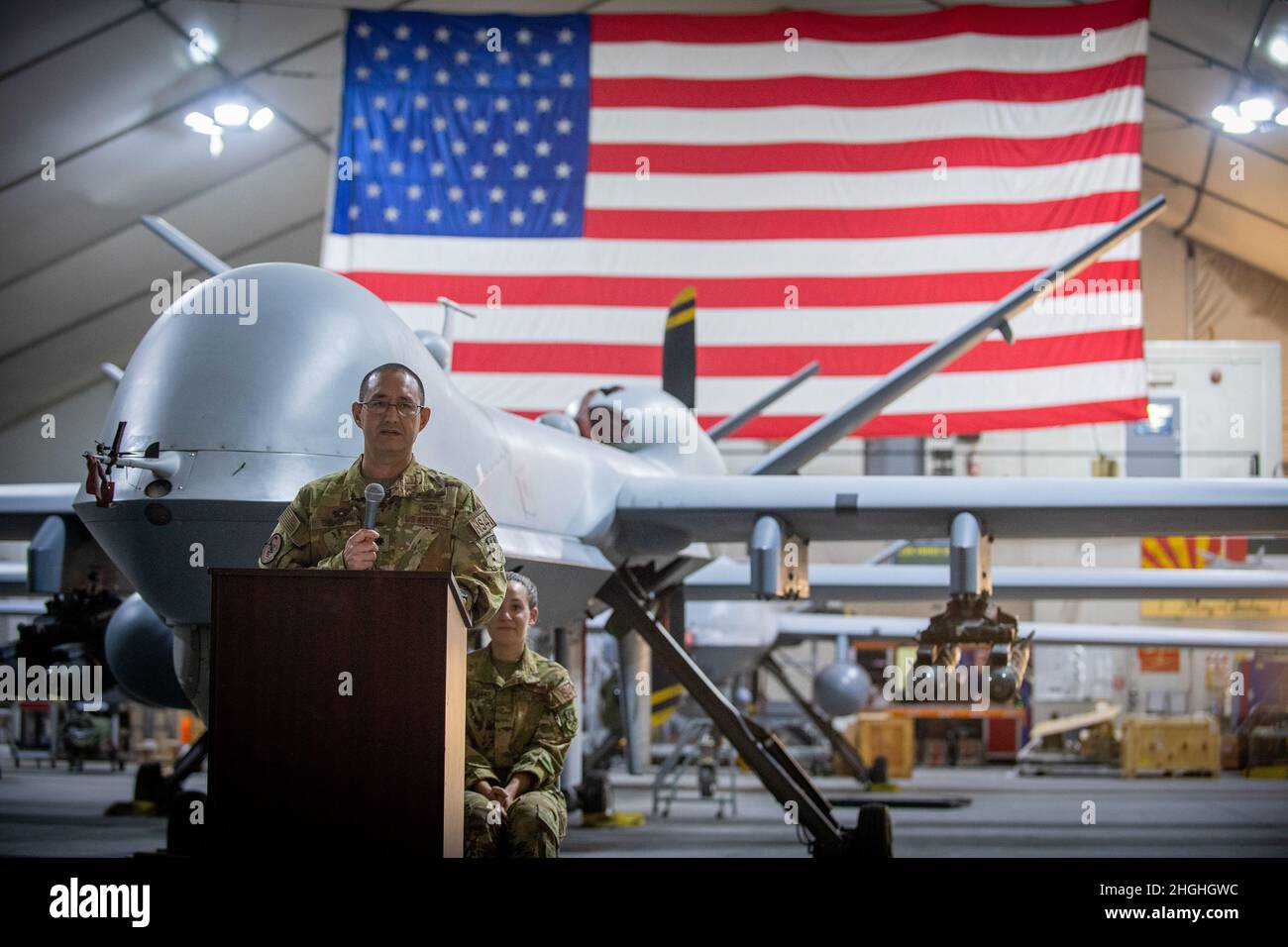 U.S. Air Force Lt. Col. Joseph Clancy, 41st Expeditionary Electronic Combat Squadron commander, gives remarks during the EECS Change of Command Ceremony at Al Dhafra Air Base, United Arab Emirates, Aug 3, 2021. Clancy assumed command of the 41st EECS from Maj. David T. Brown earlier in the ceremony. Stock Photo