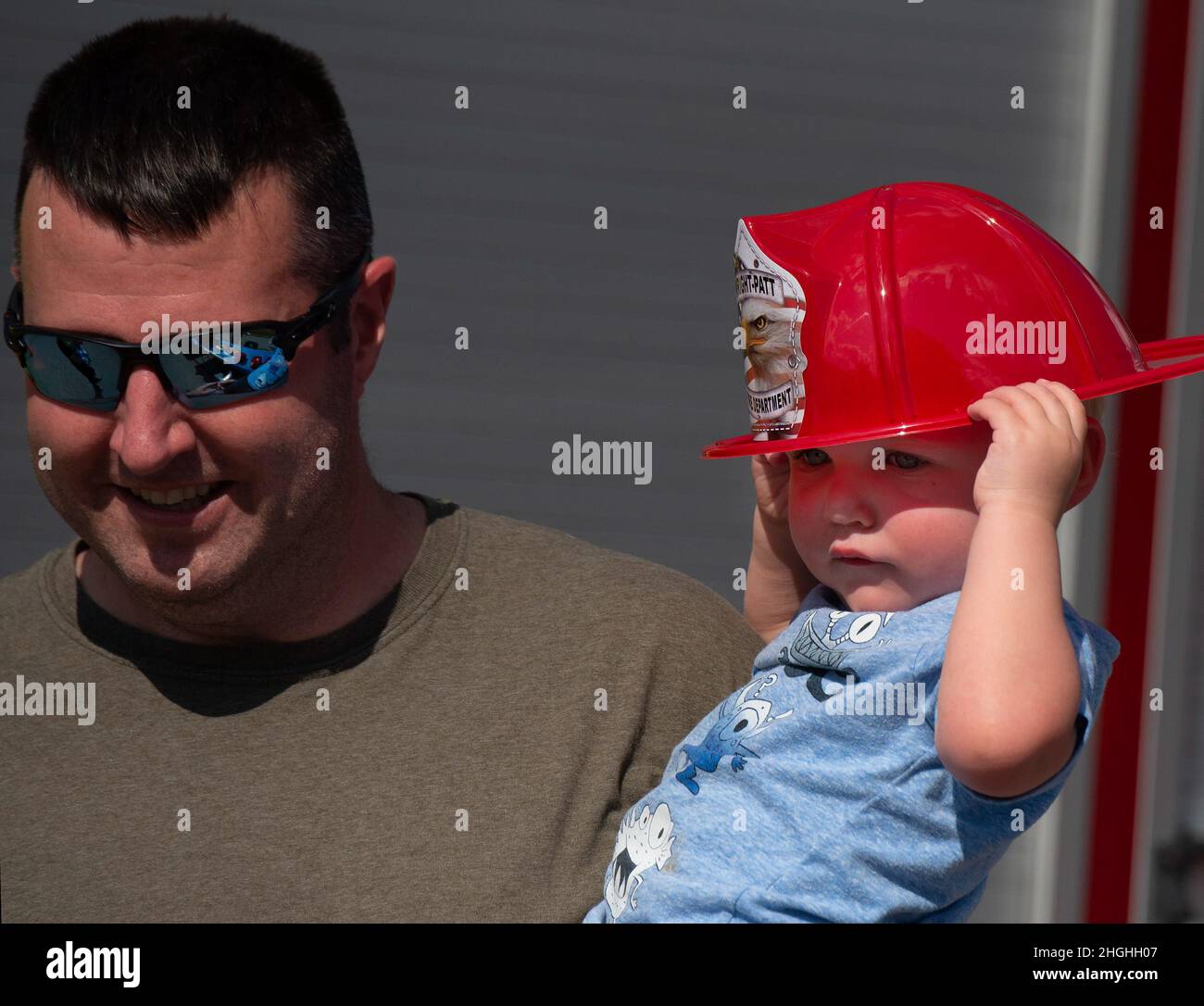 Andrew Hertzler, 2, and his dad, Jarrod, attend National Night Out at