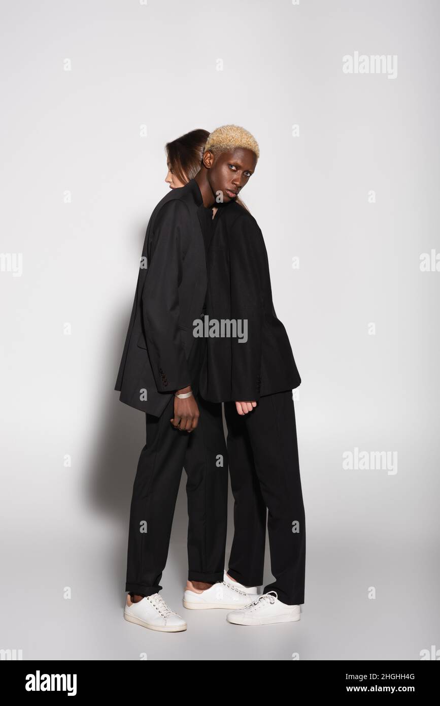 Black suits hi-res stock photography and images - Alamy