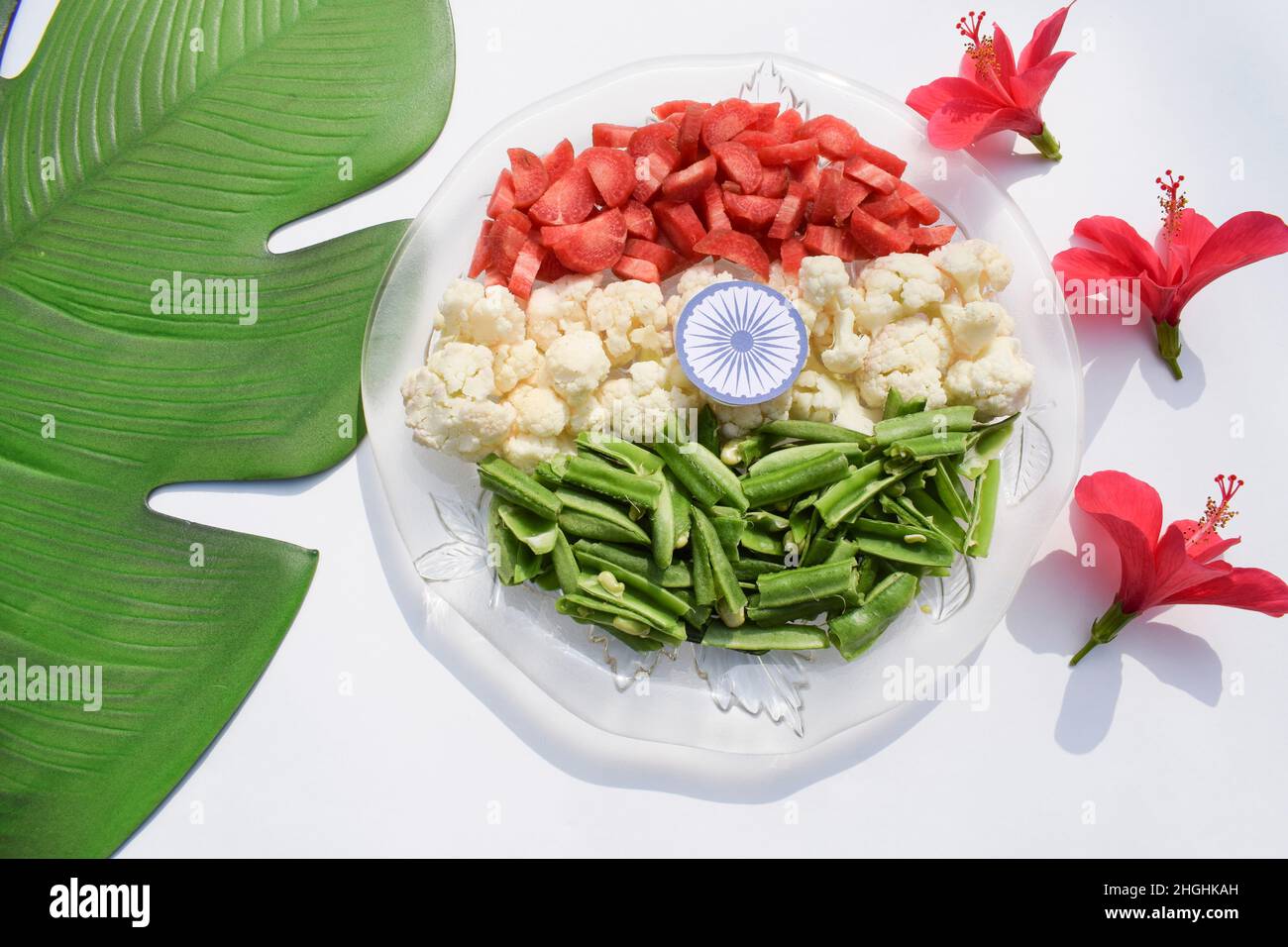 India Independence Day 15 August concept: Indian National Flag tricolour  from vegetables. Top view. White background. Tiranga made from raw  vegetables Stock Photo - Alamy