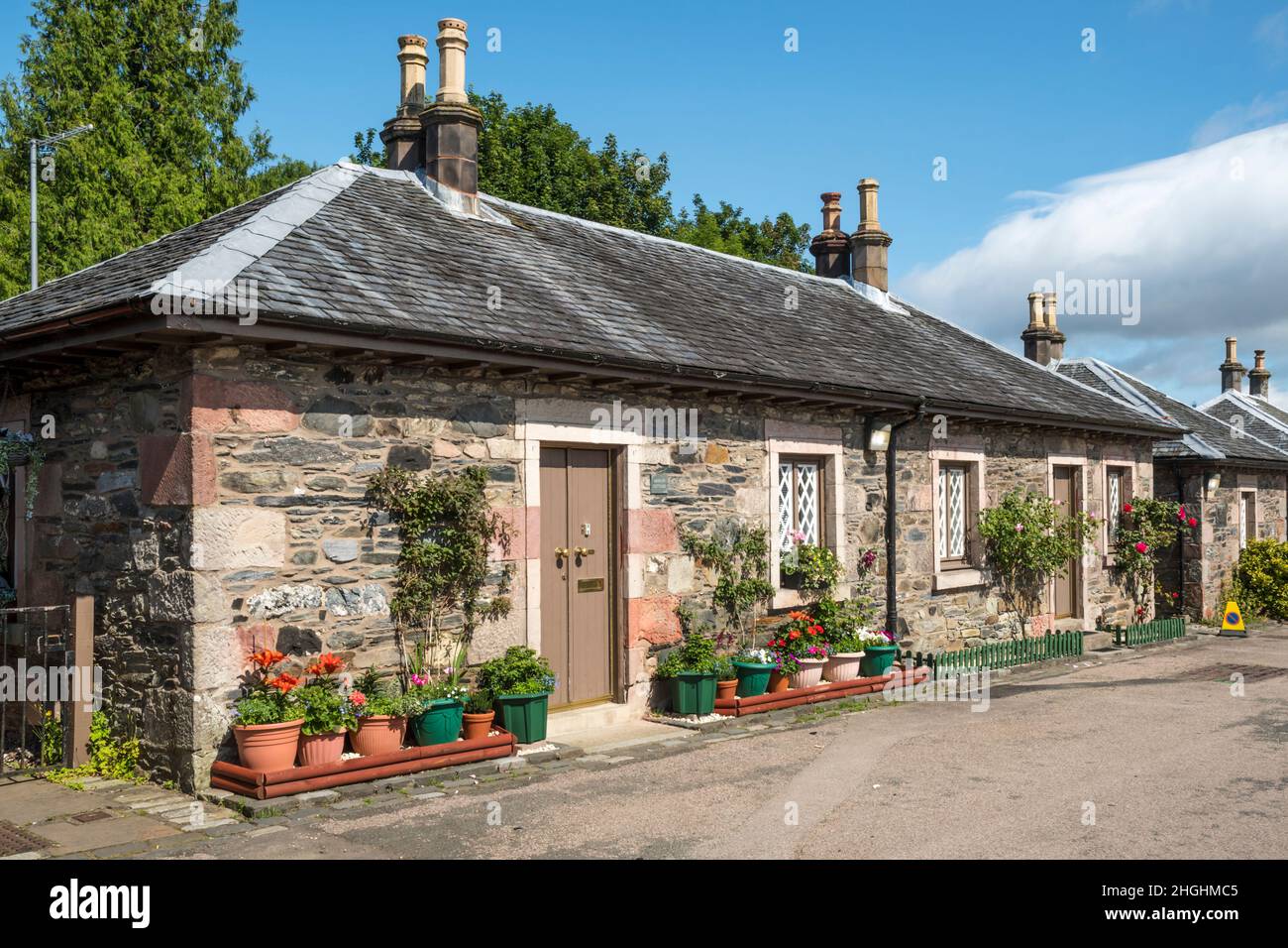 Cottages in Pier Road, Luss in the Highlands of Scotland Stock Photo