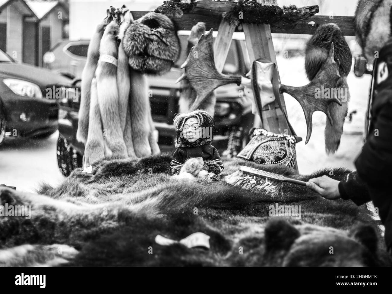 Kogalym, KhMAO-Ugra, Russia-03.31.2018:skins of bears and foxes in the market,black and white photo Stock Photo
