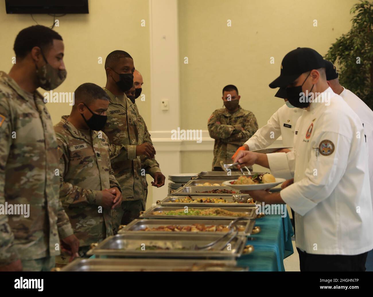 Soldiers from 3rd Infantry Division receive their meal during the ...