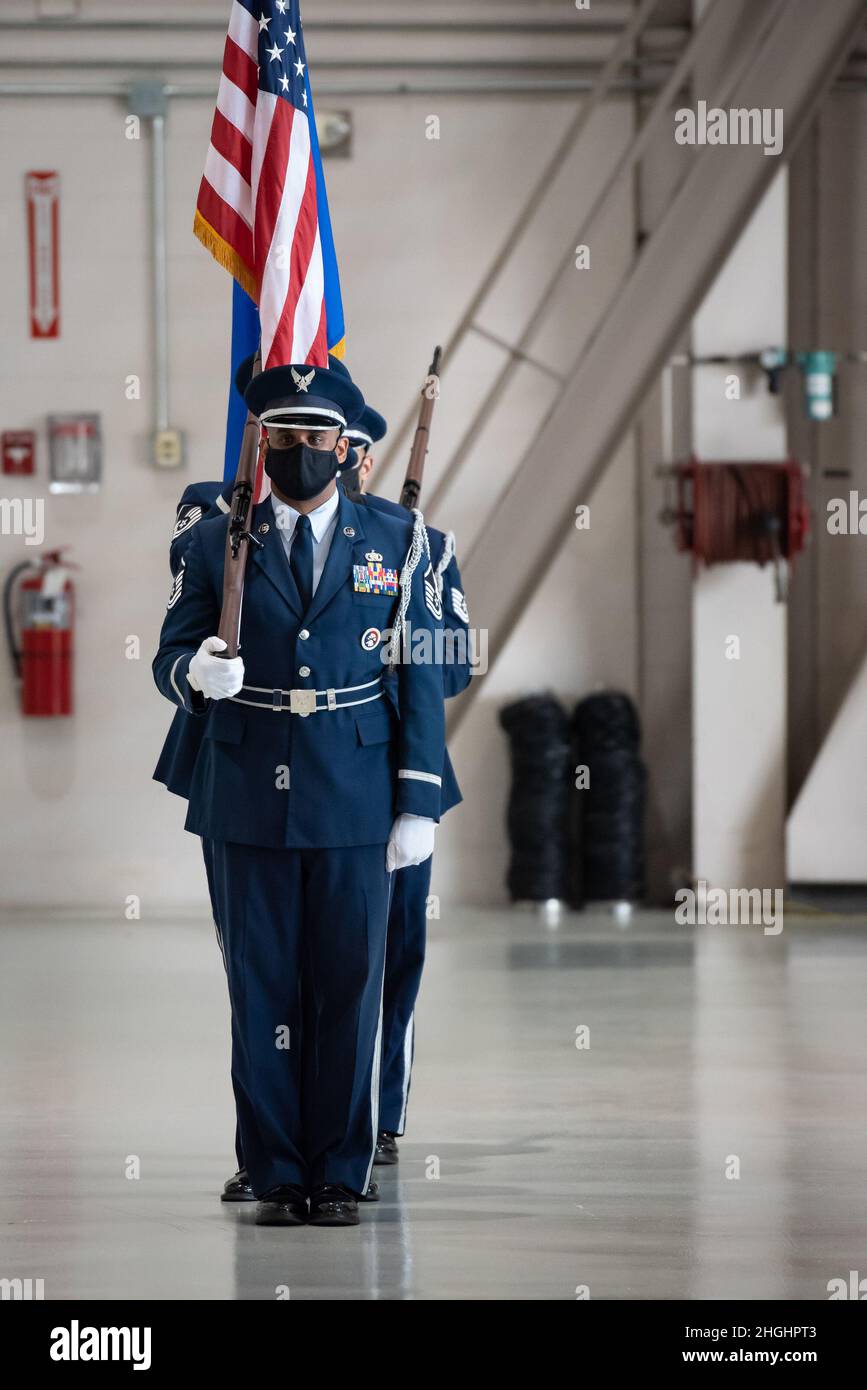 The 123rd Airlift Wing Honor Guard presents the colors during a ceremony to install a new commander of the 123rd Airlift Wing at the Kentucky Air National Guard Base in Louisville, Ky., Aug. 7, 2021. Col. Bruce Bancroft assumed the role from Col. David Mounkes, who had served as wing commander since 2016. Stock Photo