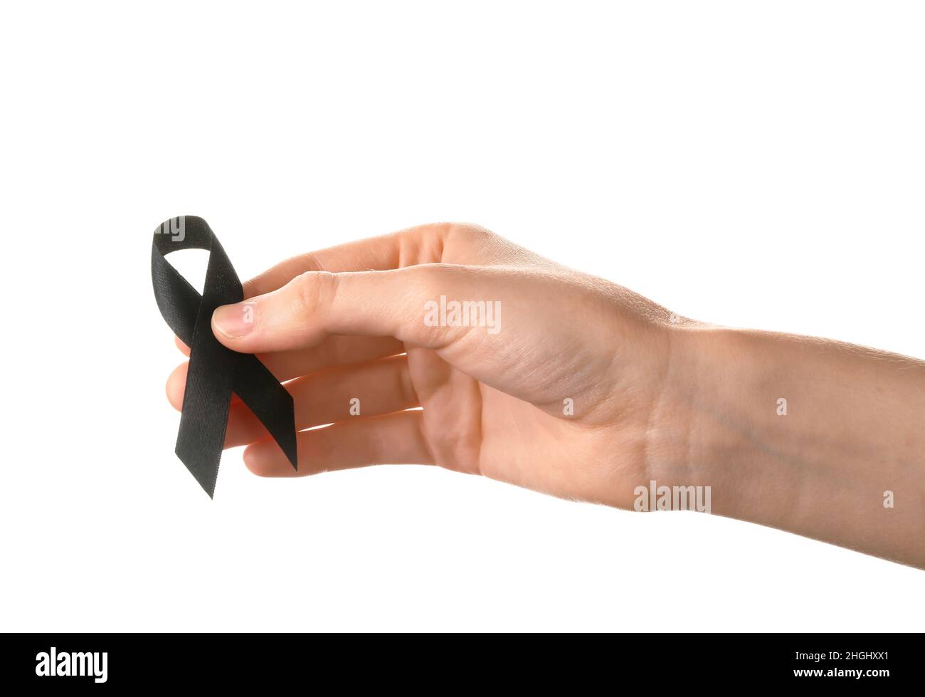 Female hand with black ribbon on white background. Melanoma concept ...