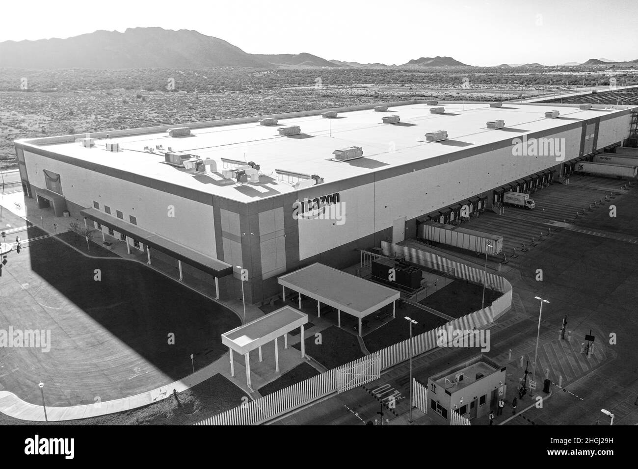 Amazon. Aerial view of Amazon warehouse or parcel distribution center in Hermosillo, Mexico. Industrial warehouse in an industrial park, logistics management of the shipment of products from online or digital sales on Amazon Prime, world leader in internet sales, global online store, facade or building architecture, Amazon Hermosillo, electronic commerce, industrial plant , economy, business, markets, electronic commerce ecommerce, ecommerce   Amazon. Vista aerea de bodega Amazon o centro de distibucion de paqueteria en Hermosillo, Mexico. Nave industri Stock Photo