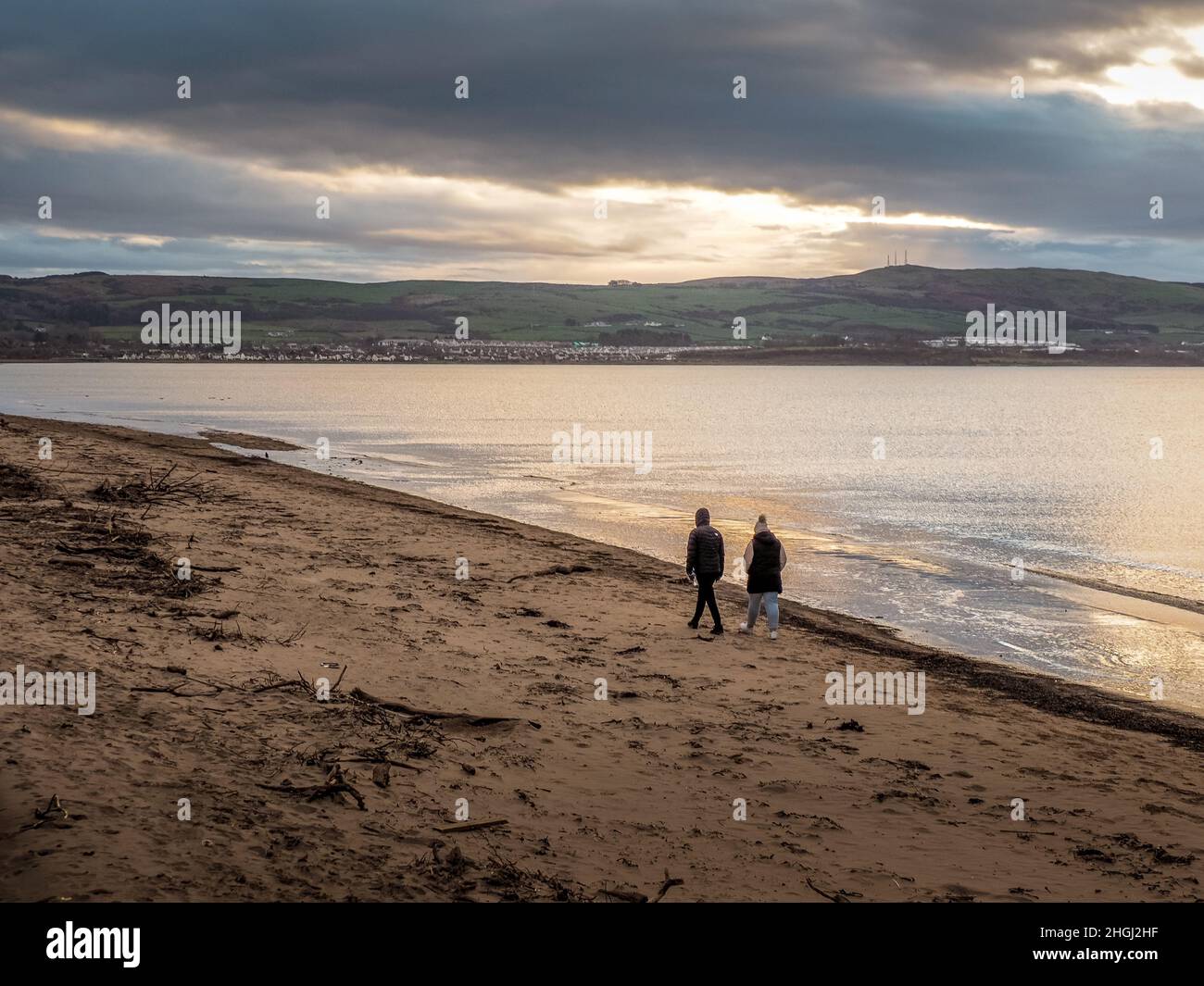 Ayr Beach on a winters afternoon with people out and about Stock Photo