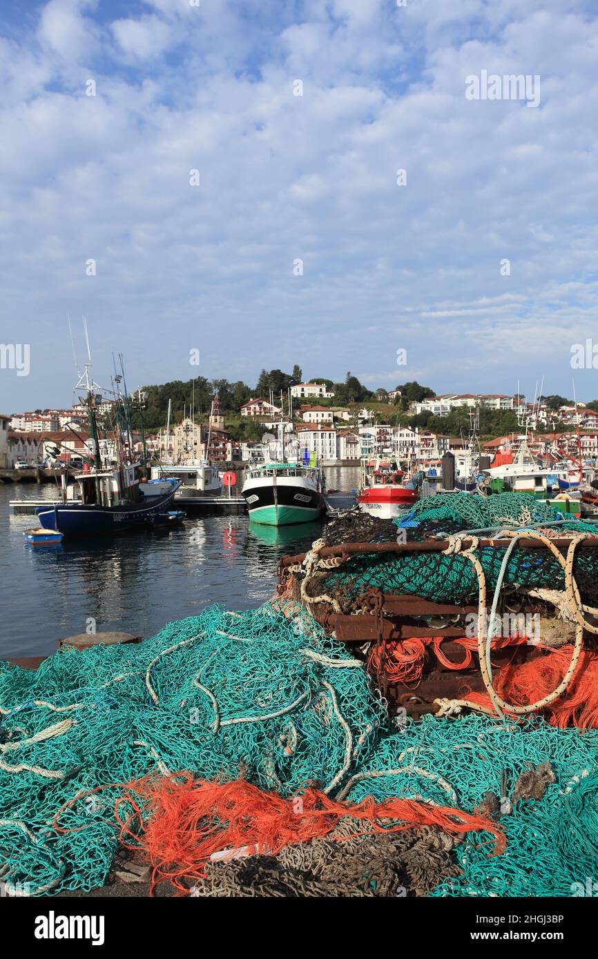 The picturesque fishing harbour of St Jean de Luz with Ciboure in the background, France, Pays Basque, Nouvelle Aquitaine Stock Photo