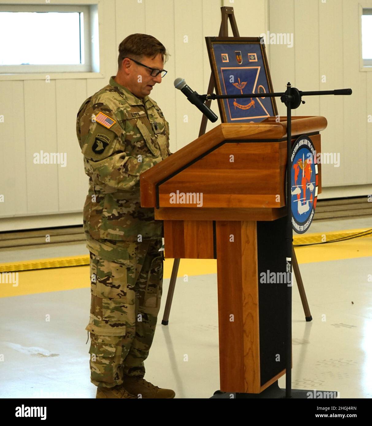 (Left to Right) Lt. Col. Randy Lutz, the incoming commander of the Eastern Army National Guard Aviation Training Site, addresses the unit for the first time after the passing of the colors during change of command ceremony at Fort Indiantown Gap, on August 12, 2021. The ceremony represented the passing of the command of EAATS from Col. Keith Graham, the outgoing commander, to Lutz Stock Photo