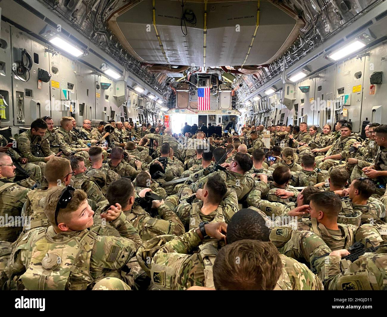 National Guard Soldiers from the Minnesota-based 34th Infantry Division pack a U.S. Air Force-operated C-17 in August following the completion of their mission in Kabul, Afghanistan.     Deployed in support of Operation Spartan Shield, about 400 Soldiers from 34th ID were temporarily relocated to Kabul, Afghanistan, and have since arrived safely in Kuwait, where they are assigned. Stock Photo