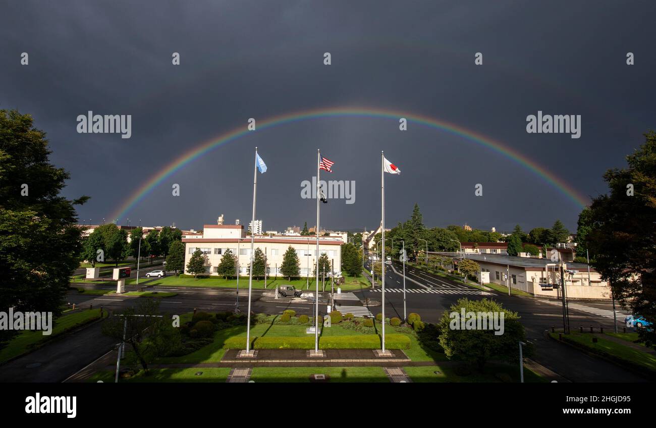 A double rainbow appears over Yokota Air Base, Japan after a rain front passed the Kanto plain, Aug. 18, 2021. Stock Photo