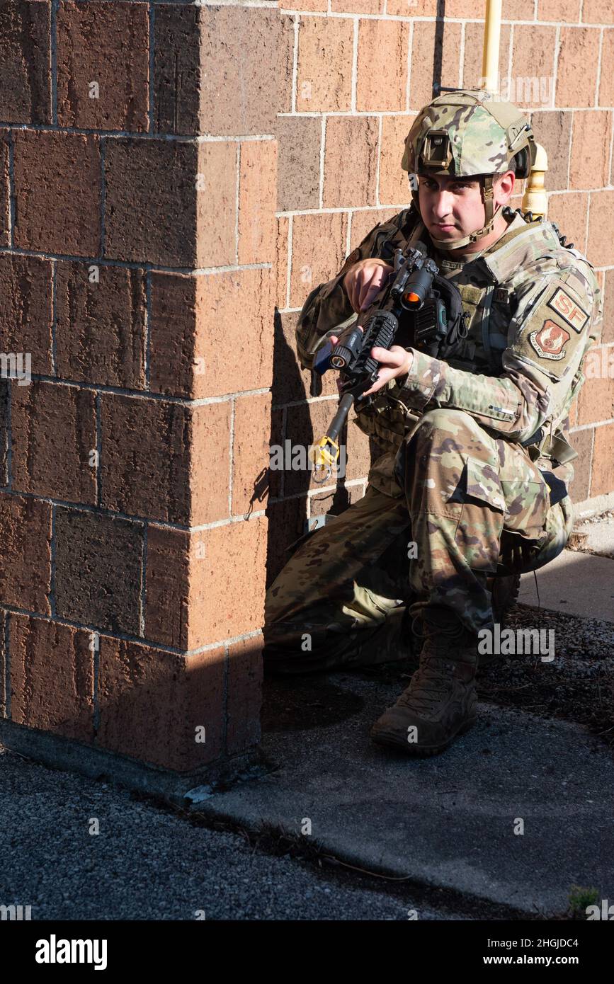 A member of the 88th Security Forces Squadron pulls security around the ...