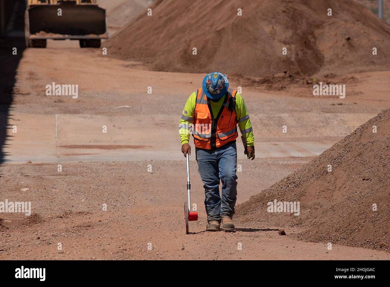 A U.S. Army Corps of Engineers South Pacific Border District contractor removes construction