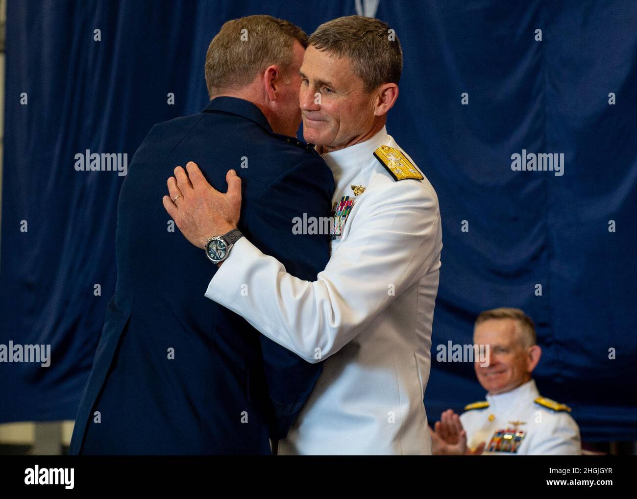 NORFOLK, Va. (Aug. 20, 2021) – Gen. Tod D. Wolters, Commander, U.S. European Command and NATO's Supreme Allied Commander Europe (SACEUR), embraces Vice Adm. Andrew Lewis during a Change of Command ceremony aboard the aircraft carrier USS Harry S. Truman (CVN 75) Aug. 20. Vice Adm. Andrew Lewis was relieved by Vice Adm. Daniel Dwyer as Commander, Joint Force Command Norfolk, Commander, U.S. 2nd Fleet, and Director, Combined Joint operations from the Sea – Centre of Excellence. Stock Photo