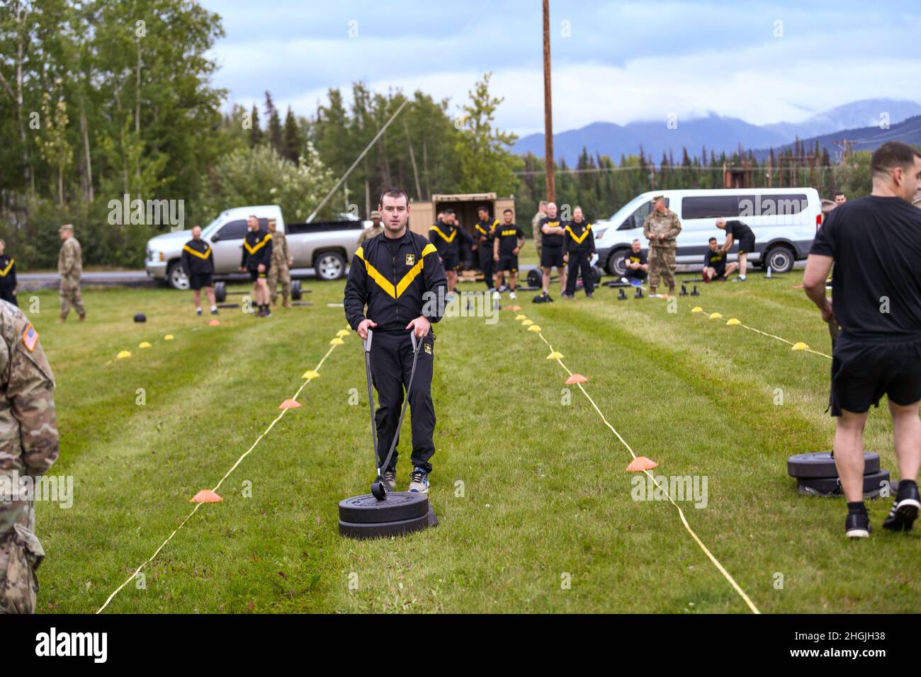Capt. Levi Vail, a plans and operations officer for the 38th Troop Command,  performs the sprint-drag-carry event during a diagnostic Army Combat  Fitness Test at Joint Base Elmendorf-Richardson, Alaska, Aug. 20, 2021.