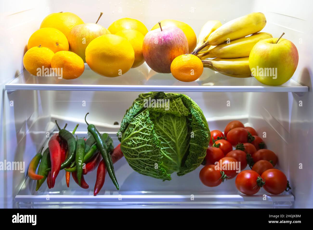 fruits and vegetables in the refrigerator. preservation of vitamin healthy food Stock Photo Alamy