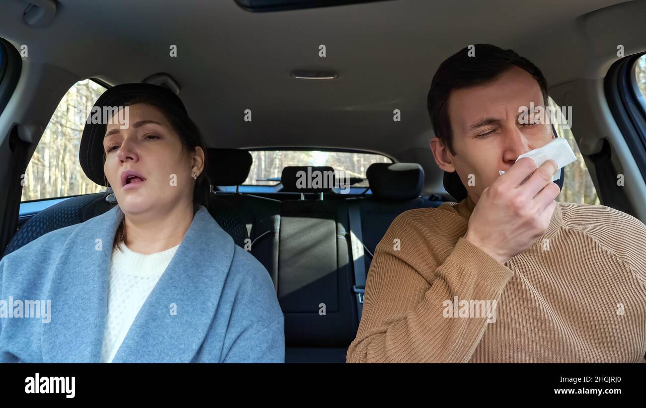 Couple catches cold during trip and sneezes endlessly Stock Photo - Alamy
