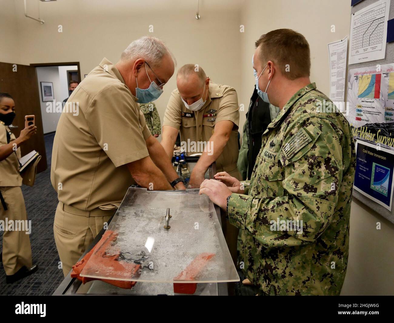 US Navy Surgeon General RADM Bruce Gillingham and Force Master Chief Michael Roberts, director of the Hospital Corps, meet with Sailors assigned to Aviation Survival Training Center (ASTC) Whidbey Island to discuss the importance of medical readiness and the critical role Navy Medicine’s people and platforms contribute to our Navy’s power projection. Stock Photo